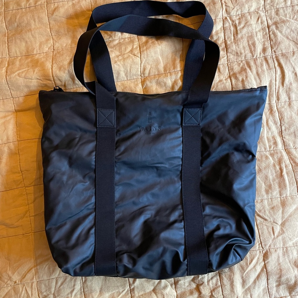 RAINS waterproof tote bag in excellent condition